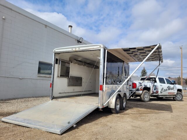 16' Enclosed Trailer. Fridge, Microwave, and Shelves work bench. Tie Down for 2 bikes.